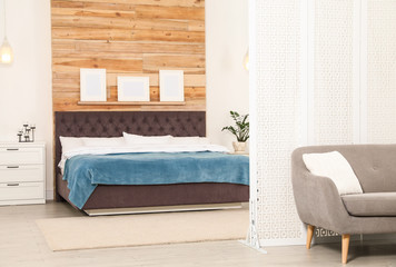 Modern folding screen in stylish room interior