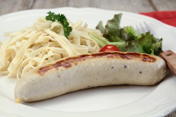 white pudding and pasta on a plate