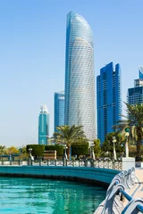 Papier Peint photo Lavable Abu Dhabi Abu Dhabi Corniche walking area with landmark view of modern bui