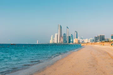 Gordijnen Abu Dhabi city beach and walking area with landmark view © creativefamily