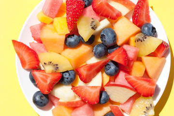Colorful fruit salad in a bowl.
