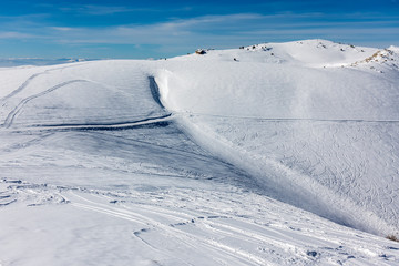 Obraz premium Snowy slopes in 3-5 Pigadia ski center, Naoussa, Greece