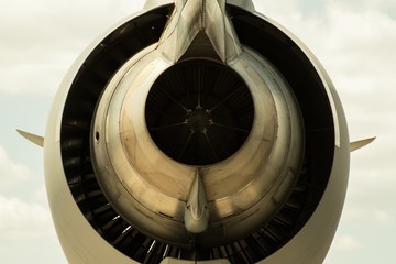 Low angle shot of a big airplane engine ready to take off