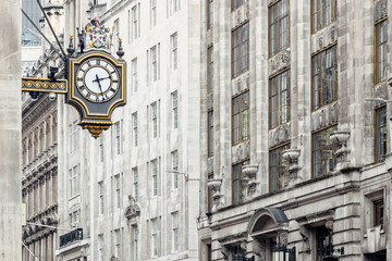 Fototapeta na wymiar The exterior clock on bank of england museum building in London