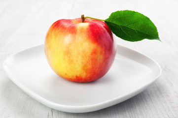Fresh apple on wooden backgound