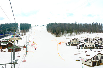 Picturesque landscape of the Carpathians at the ski resort, high lifts for skiers.