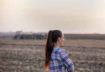Farmer woman with at corn harvest