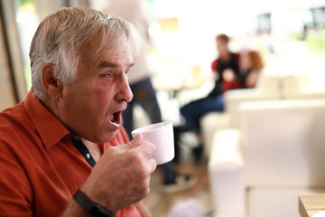 Senior man drinking coffee