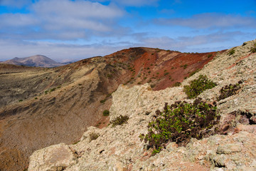 Lanzarote rocky volcanic landscape with mountains