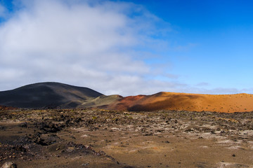 Lanzarote rocky volcanic landscape with mountains