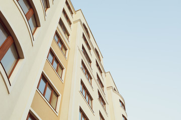 Beautiful building against blue sky, space for text