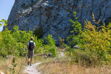Fototapeta premium A tourist is walking on the Zmeyka Mountain in the Mineralnye Vody city 