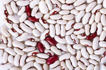 raw red and white beans background, top view, isolated on a white background
