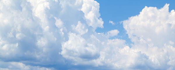 White cumulus clouds in blue sky at daytime