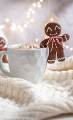 Fototapeta na wymiar Gingerbread cookie man with a hot chocolate for Christmas holiday