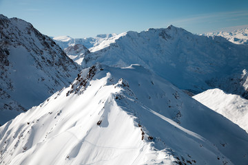 Fototapeta na wymiar snowy mountains peak in the Alps