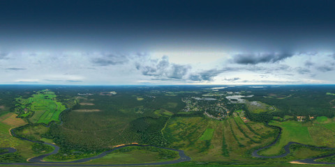 Beautiful landscape. Latvian nature. Forest and river. View from above.