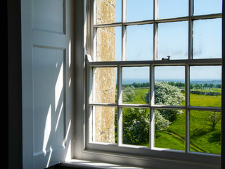 view through a window on the cotswolds