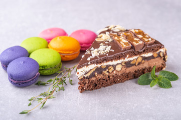 chocolate cake with cakes on a gray background