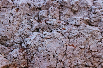 gray rock granite fractured cracks texture background