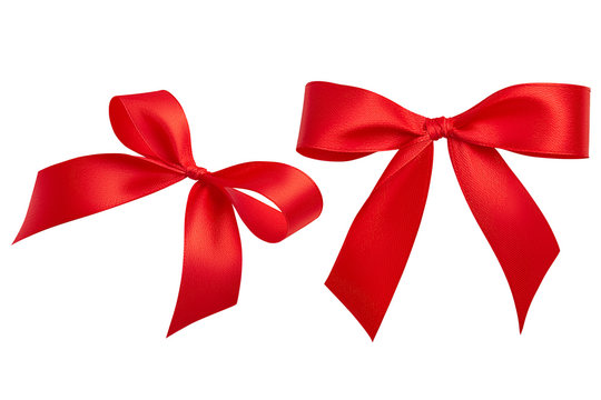 A closeup set of two detailed simple bright red handmade bows  from a red silk ribbon. Side view and top view. Design elements, clipping path.