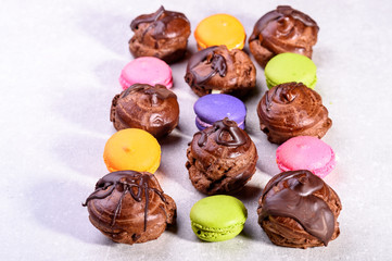  chocolate eclairs and macaroons for the restaurant menu