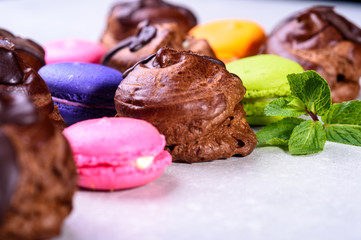chocolate eclairs and macaroons for the restaurant menu1