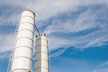 Silo for storage of cement. Storage of materials in the production of concrete.