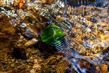 Beautiful texture of water ripples in a shallow creek