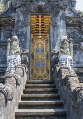 Door of the historic Pura Goa Lawah temple on Bali