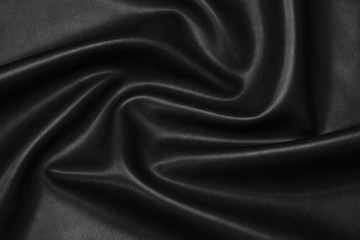 Obraz premium black artificial leather with waves and folds on PVC base