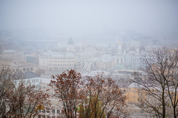Kyiv city the capital of Ukraine, Podil in fog in autumn 2019