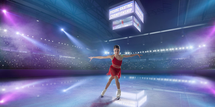 Figure skating girl in ice arena.