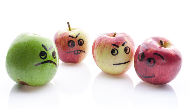 Face painted apples. Jolly and sad funny apples. Green and red apples on a white background.