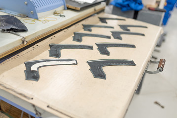 Duplication of the details of the top, calico with impregnation with glue. Shoe production.