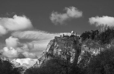 Tower on Cliff with dramatic sky and cliff edge in black and white room for graphics