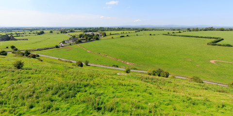 Fototapeta na wymiar rural landscape with field and blue sky in Ireland
