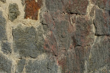 gray brown texture of large stones in cement