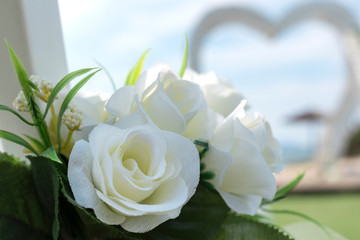 Wedding decorations of a chair on the famous Sidari beach near the D'Amour canal on the island of Corfu, Greece.