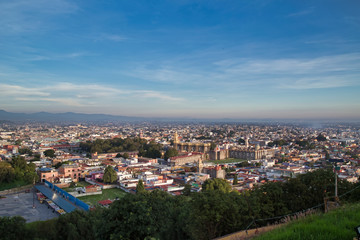 Fototapeta na wymiar sunrise, panoramic view of the city of San andres Cholula Puebla
