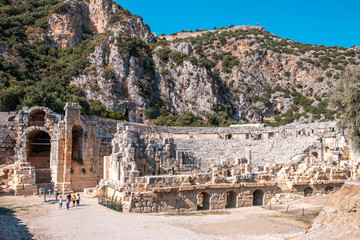 Fototapeta na wymiar Myra Carved Stone Houses and Tombs, Ruins of Myra Ancient City, Demre, Antalya, Turkey