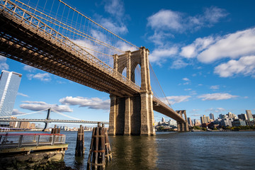 Brooklyn Bridge in daylight view from Lower East Side waterfront