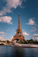 Naklejka na ściany i meble World famous Eiffel tower at the city center of Paris, France.