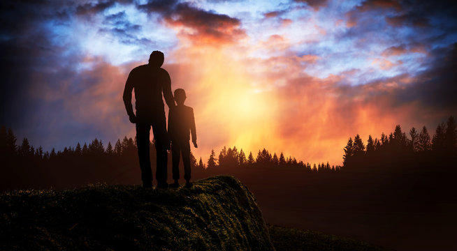 Father And Son At Sunset