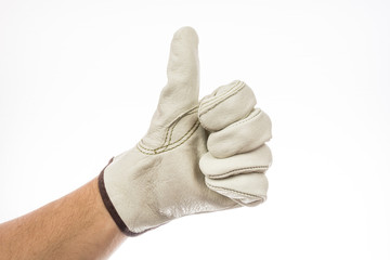 Thumbs up sign, white leather work glove isolated on a white background.