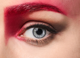 Young woman with creative eyebrows, closeup