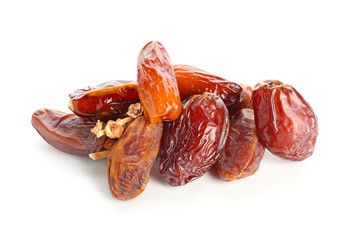Tasty dried dates on white background