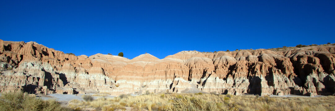 Wide panorama of a colorful rock wall at Cathedral Gorge State Park near Panaca, Nevada