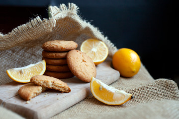 lemon cookies made at home, citrus baking deliciously lies on a table in a fabric, a recipe for fruit baking