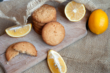 lemon cookies made at home, citrus baking deliciously lies on a table in a fabric, a recipe for fruit baking